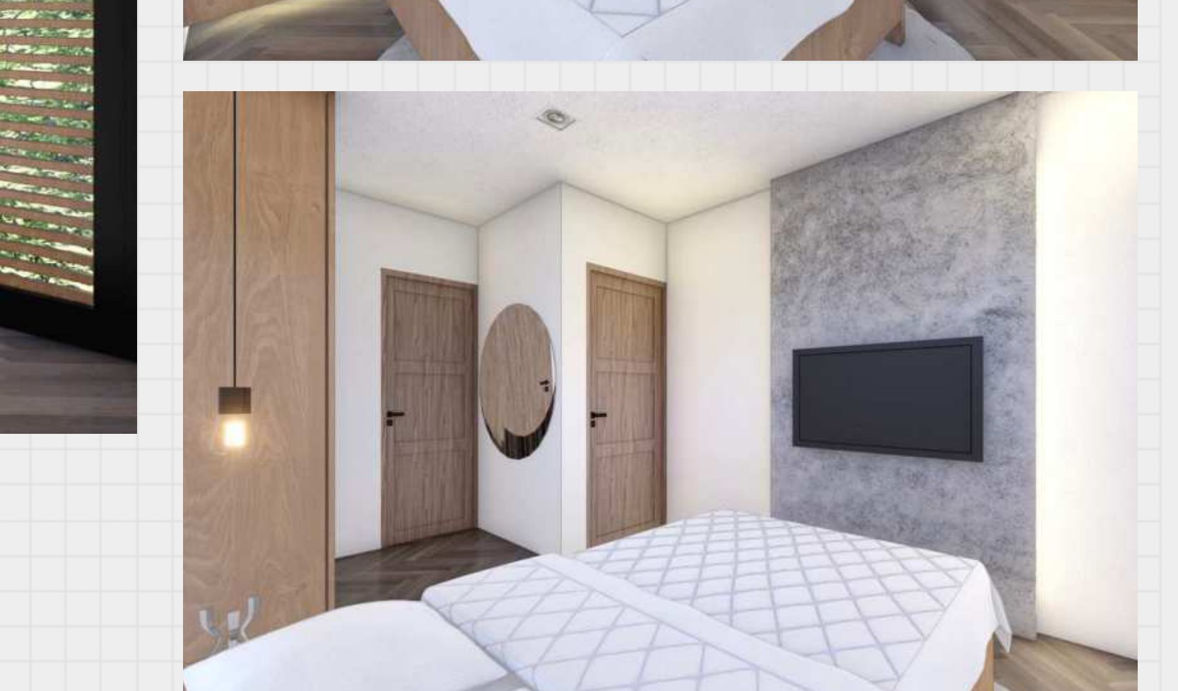 Bedroom sitting area with a concrete accent wall and television