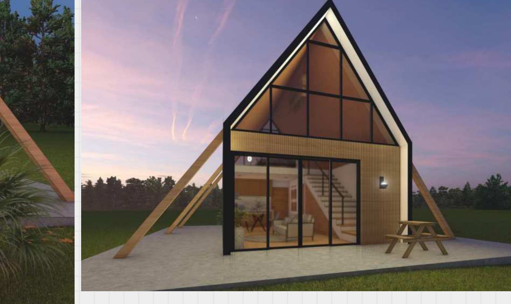 A-frame cabin at dusk with an open glazed corner and picnic table